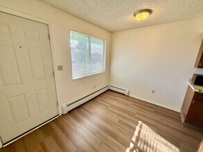 Building Photo - Move in specials - Pick One - Flexible lease terms are available  - 2 Bed, 1 Bath Apartment.