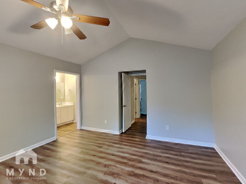 Building Photo - 7001 Lazy Breeze Cir