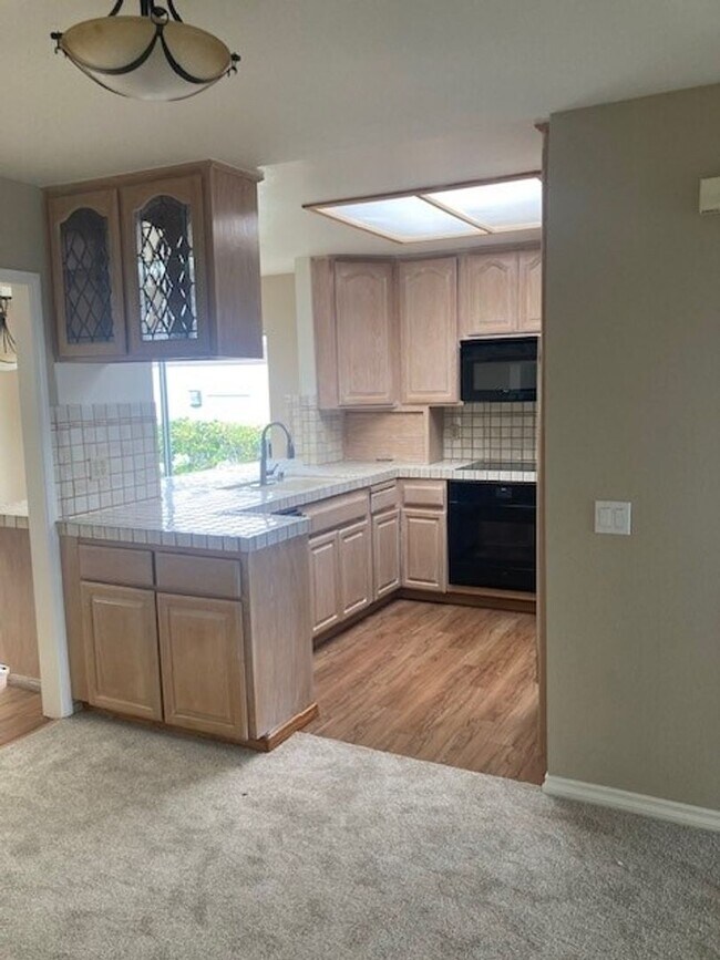 Building Photo - Single level 2-bedroom 2-bath home in private community of Ocean Hills