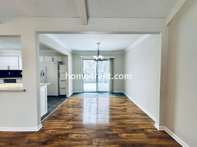 Building Photo - A Lovely Four Bedroom Home in Lenexa w/ Wood Floors, Finished Basement and a Fenced Yard!