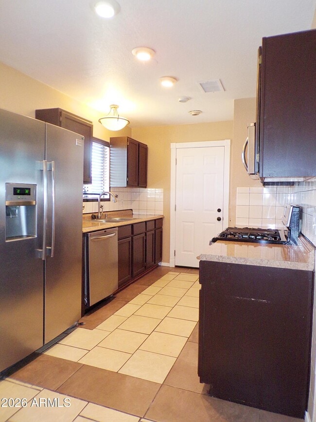 Building Photo - 10033 S Honeysuckle Dr