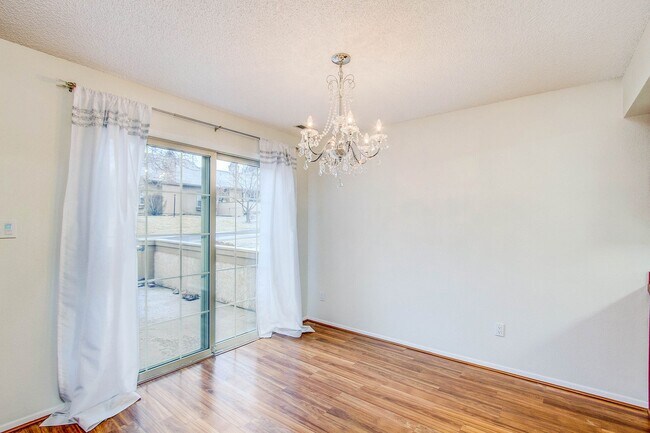 Building Photo - Impeccably Maintained End Unit Townhome with 2-Car Garage: Effortless Comfort & Convenience Await!