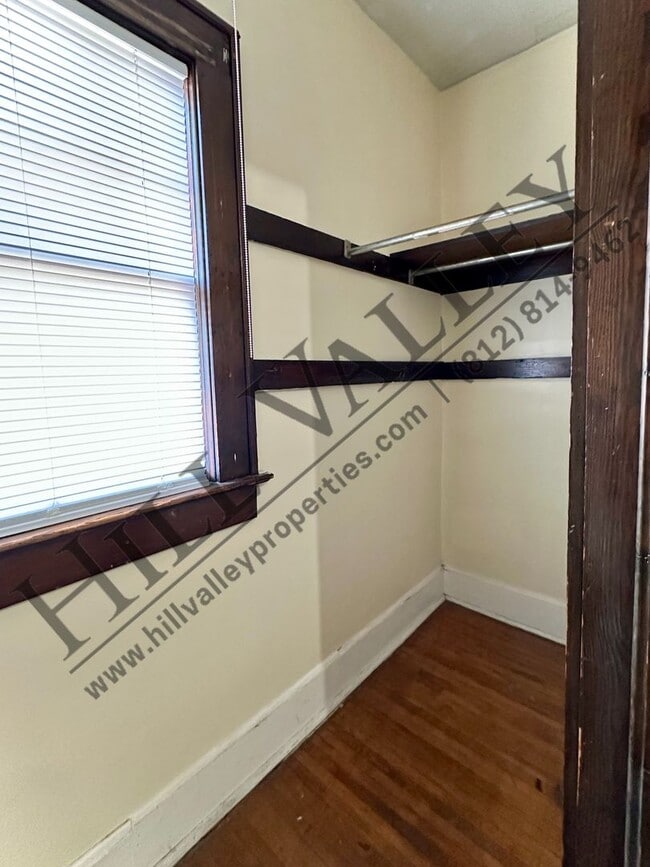 Building Photo - Two Bedroom Upper - All Utilities Paid