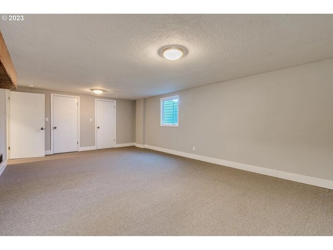 Building Photo - Stylishly Updated Mid-Century Gem on a Qui...
