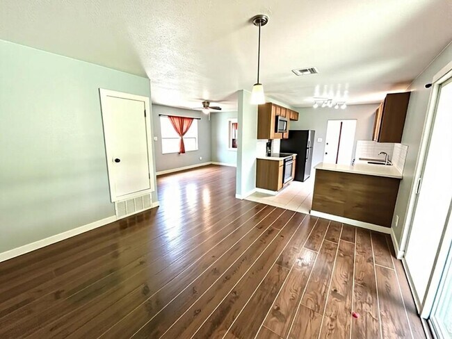 Building Photo - *COMING SOON* *MOVE IN SPECIAL* Spacious 3BR with Office & Large Fenced Backyard!