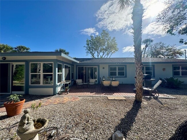 Building Photo - 7372 Melaleuca Way