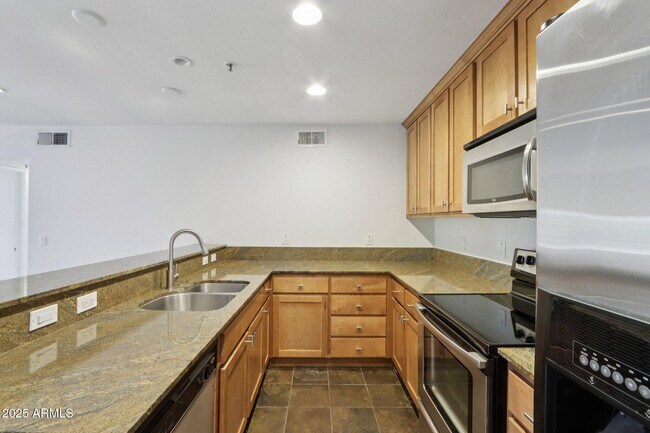 Building Photo - 4704 E Paradise Village Pkwy N
