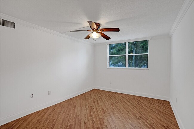 Building Photo - 9351 Lime Bay Blvd