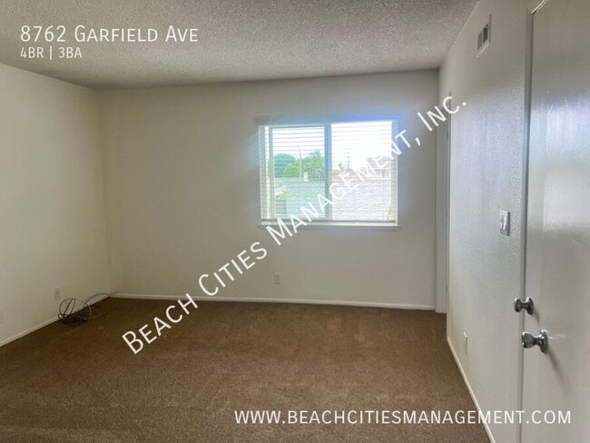 Building Photo - 8762 Garfield Ave