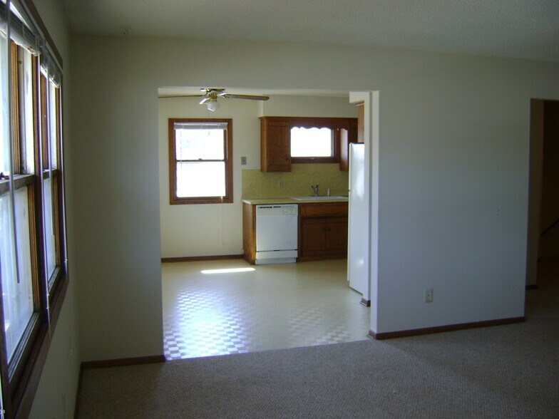 Living room looking into kitchen and dining room area - 2233 5th Ave, NE