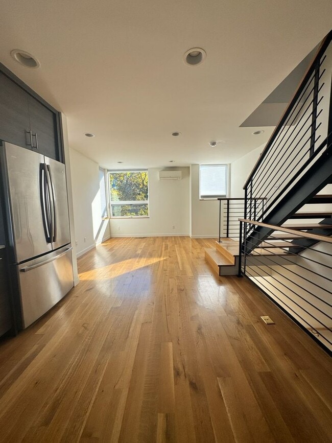 Building Photo - Elevate your living experience with this i...