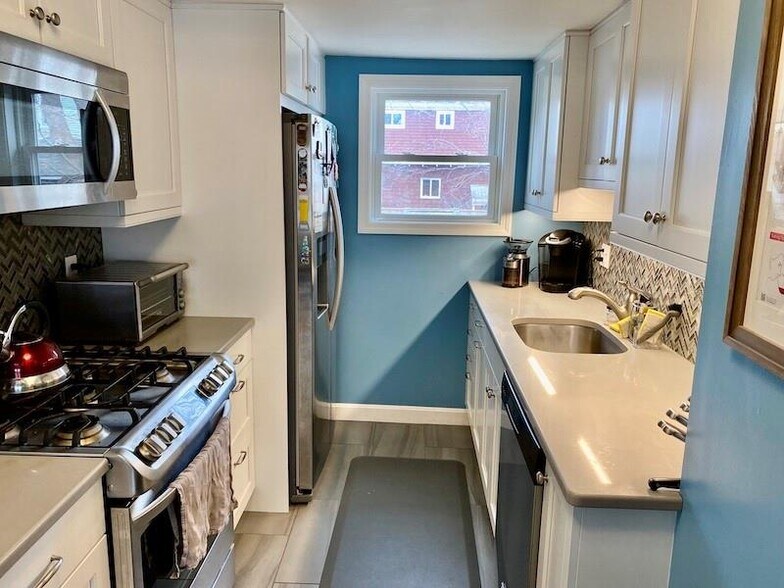 Recently updated galley-style kitchen - 4 Curry Ave