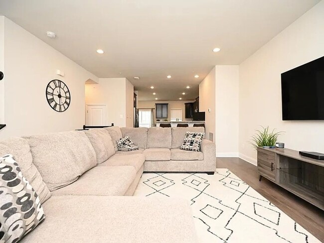 Building Photo - Stunning 3-Story Brick-Front Townhome | Modern Living + Military & First Responder Discount