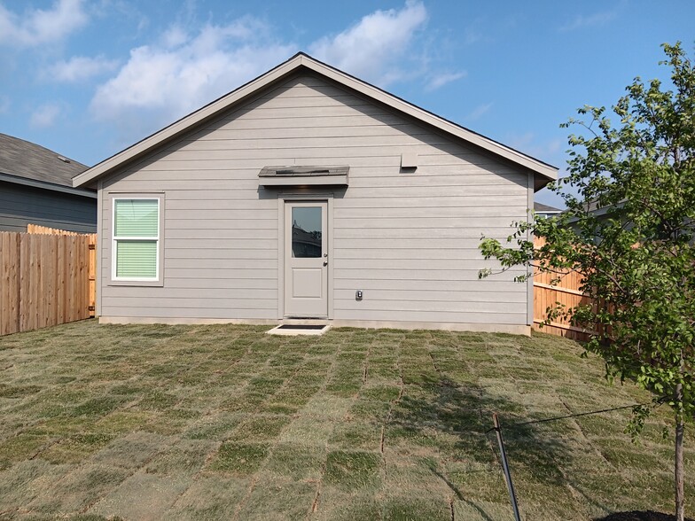 Rear View and Back Yard - 20336 Red Coral