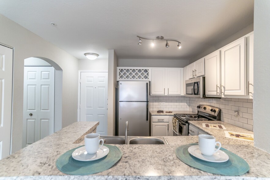 Kitchen at Mission Club Apartments in Orlando, FL - Mission Club Apartments