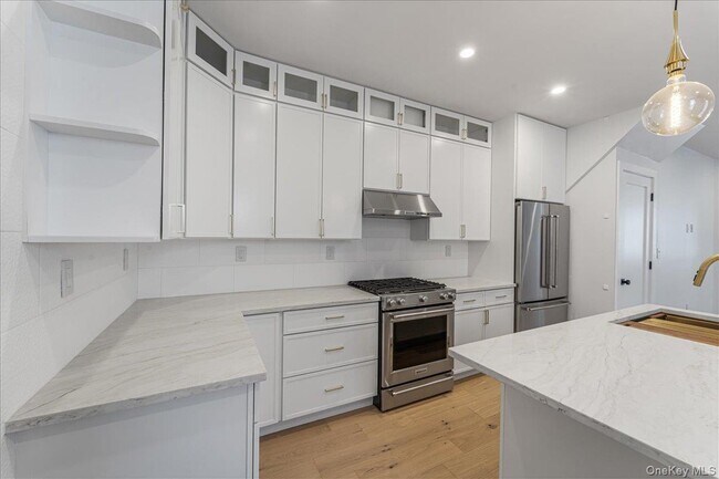 Building Photo - 36-34-36-11 11th St