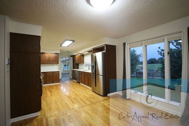 Building Photo - Westside Schools - 3 bed/ 2 bath 2,300 sq.ft.., den/family room, deck in the country on a paved r...