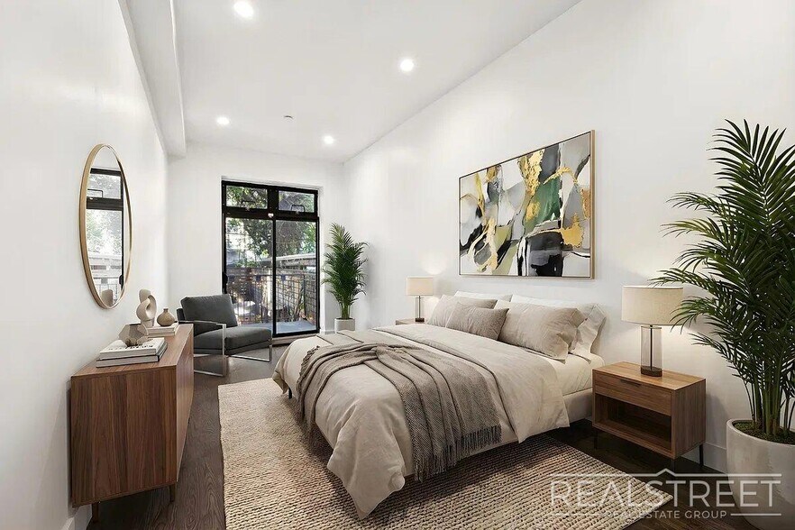Building Photo - Modern Bushwick 2-bedroom, 2.5-bath duplex with private garden, deck, and finished recreation room —