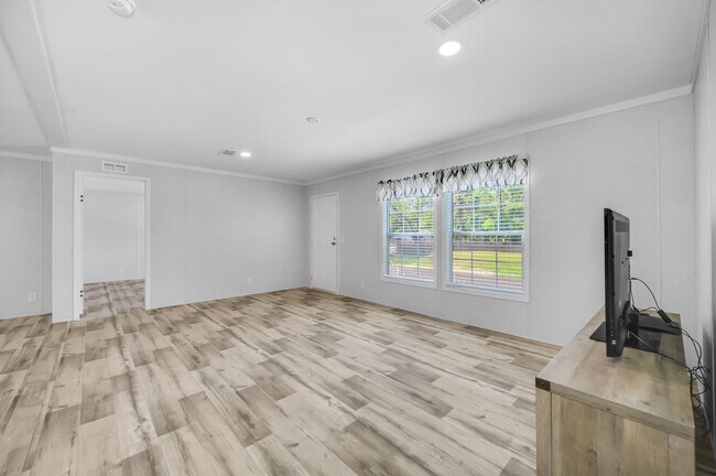 Building Photo - Experience exceptional living at its finest