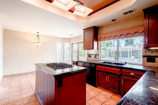 Building Photo - 4 Bedroom/2.5 Bath Home with Paid Solar an...