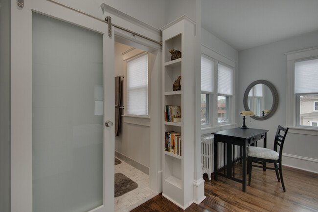 Master bedroom and sliding door into the bathroom. - 3020 Columbus Ave