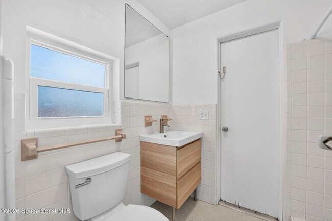 Building Photo - Welcome to this beautifully remodeled 4-bedroom, 3-bath home in the heart of Indialantic Beach!