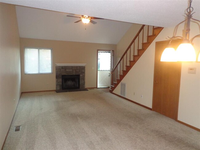 living room w/fireplace - 6955 Dorr St