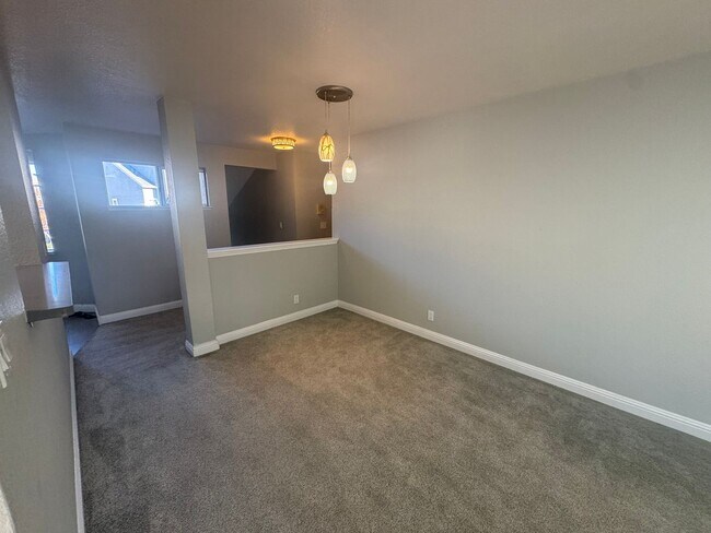 Building Photo - Charming top-level 2-bedroom, 1-bath condo in a highly desirable gated community.