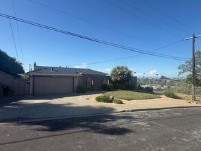Building Photo - Remodeled 3 Bedroom Home with Bay Views + Stunning Backyard Patio
