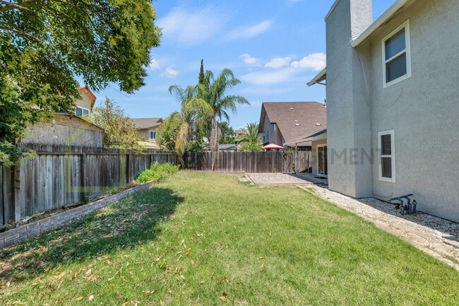 Building Photo - Spacious 4-Bedroom Home for Rent - $2800/m...