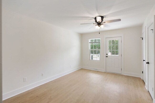 Building Photo - Available now. Water included. RENOVATED 2 BR/1.5 BA Townhouse in the Heart of James Island!