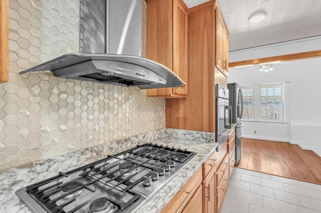 Building Photo - Charming home with large garage & attached...