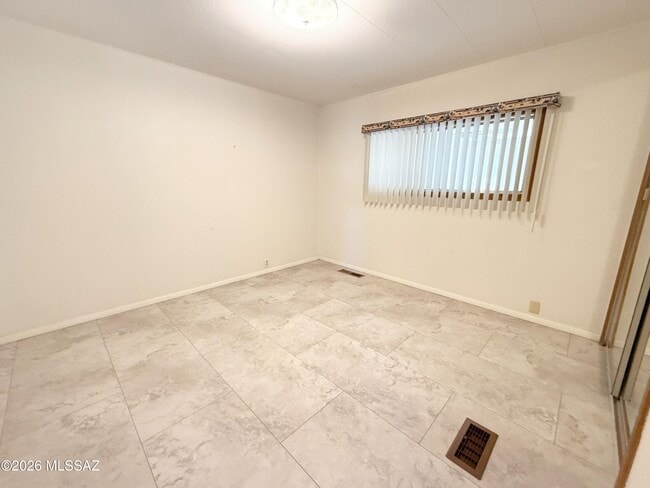 Building Photo - 10675 N Kilimanjaro Ave
