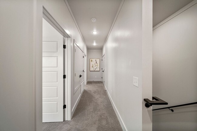 Building Photo - Discover modern elegance in the newly constructed Edgewater Condominiums, a boutique community fe...