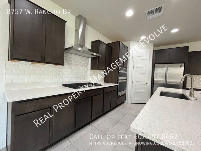 Building Photo - 8757 W Rancho Dr