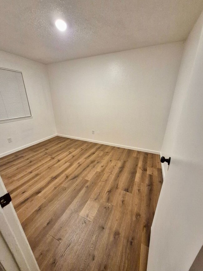 Building Photo - Charming 3-Bedroom Home with Large Backyard & One-Car Garage