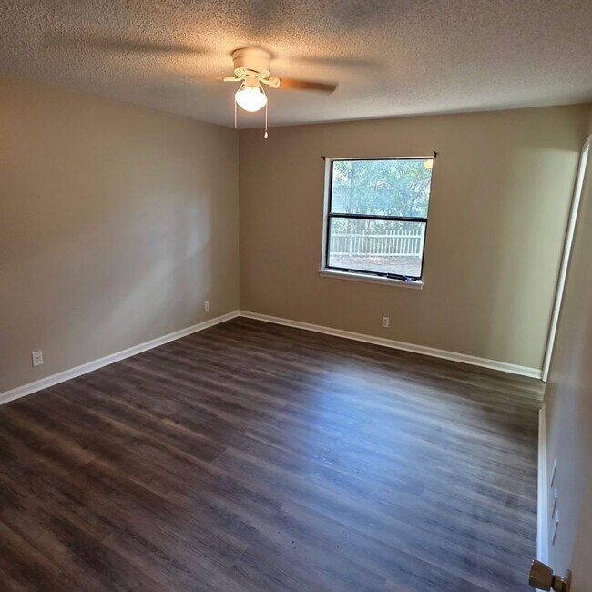 Building Photo - Corner Lot Charm: Spacious 4 Bed on Corner Lot w/ Custom Bookshelves & Private Storage Shed