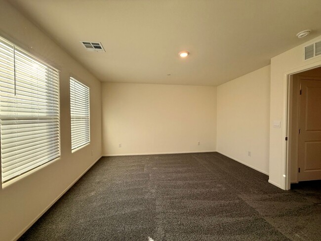 Building Photo - Brand-New Townhome for Rent in the Highly ...