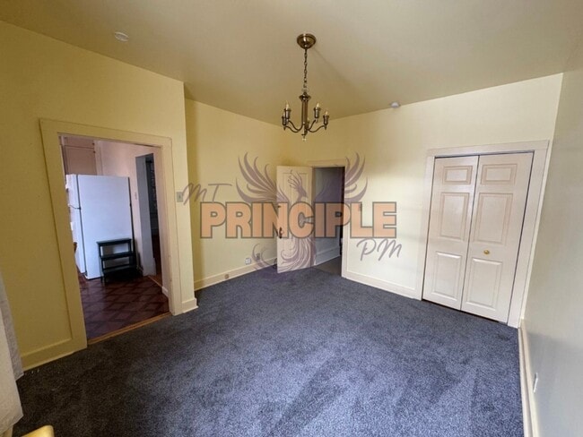 Building Photo - Charming Three-Bedroom Home with Garage and Yard