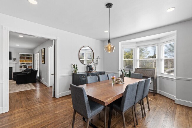 Building Photo - Luxurious Brick Colonial in Prestigious Gu...