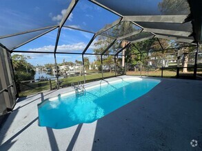 Building Photo - $2,495 ** Annual ** Custom, Renovated Pool...