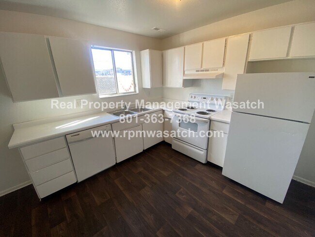 Building Photo - Check Out This Charming 3 Bedroom 1.5 Bathroom Condo in Midvale Ut!