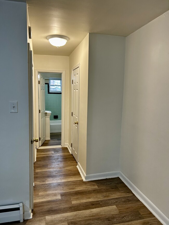 Hallway area leading to bathroom, Includes utility closet and hall closed - 6008 N 12th St