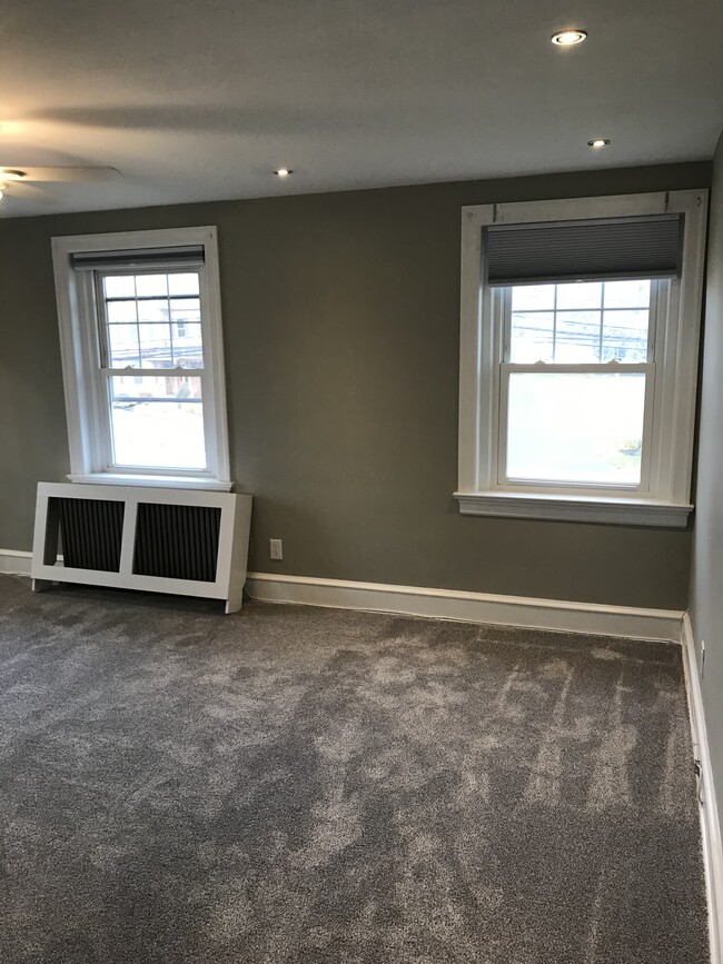 Expansive living area, newly renovated with new carpeting - 430 Main St