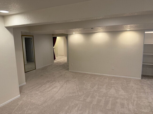 Building Photo - Spacious 4-Bedroom Ranch with Finished Bas...