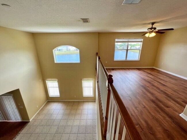 Building Photo - EAGLE CREEK LAKE NONA! WELCOME HOME! Beautiful water views! Spacious 2 story-3 bedroom 2.5 bath h...