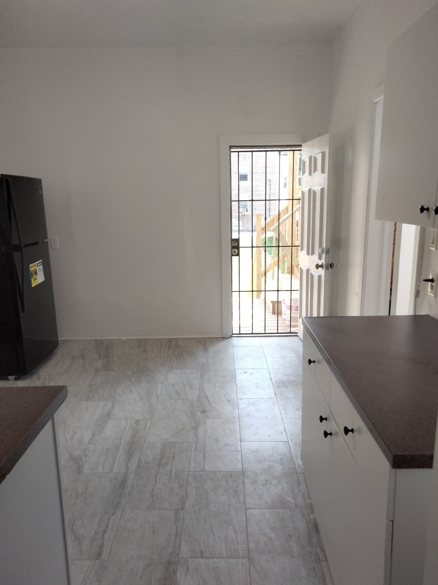 Open back door - 4203 W Maypole Ave