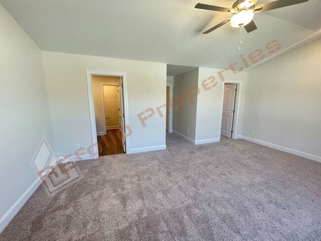 Building Photo - Brand New 3 Bedroom 1-Car Garage Townhome ...
