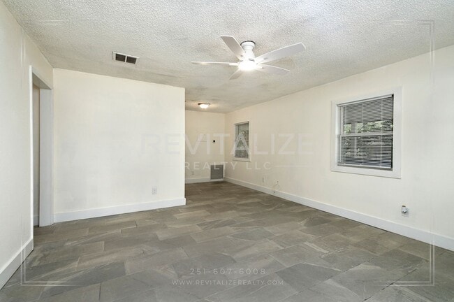 Building Photo - 3 BR 2 BA Home with Fenced Yard & Carport