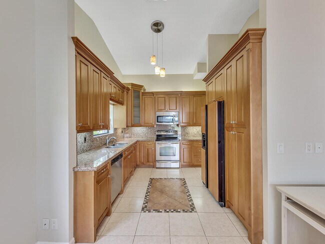 Building Photo - 7747 Villa Nova Dr N